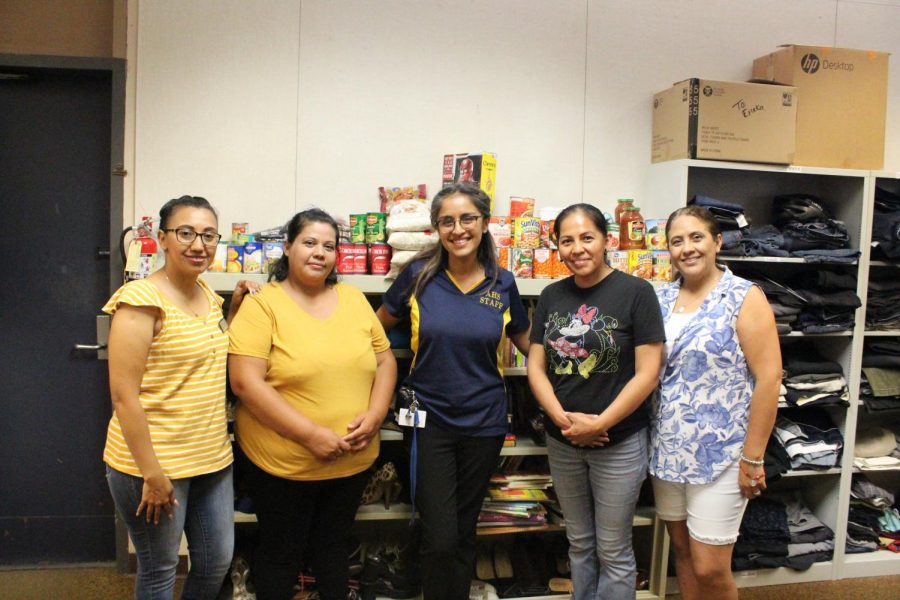 Parent volunteers help keep the Colonist Closet full of essentials for students. 