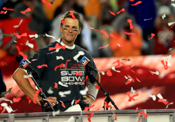 TAMPA, FLORIDA - FEBRUARY 07: Tom Brady #12 of the Tampa Bay Buccaneers signals after winning Super Bowl LV at Raymond James Stadium on February 07, 2021 in Tampa, Florida. (Photo by Mike Ehrmann/Getty Images)