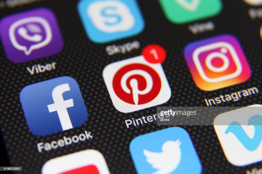 Berlin, Germany - 05 21 2016:  Apple iPhone 6s screen with social media icons applications Facebook, Instagram, Twitter, Google, Youtube, Vimeo, LinkedIn, Pinterest, WhatsApp etc.