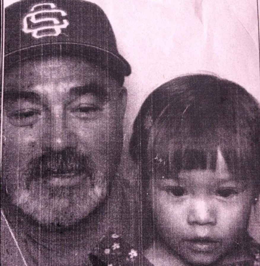 Ms. Baca as an infant with her beloved Grandfather.