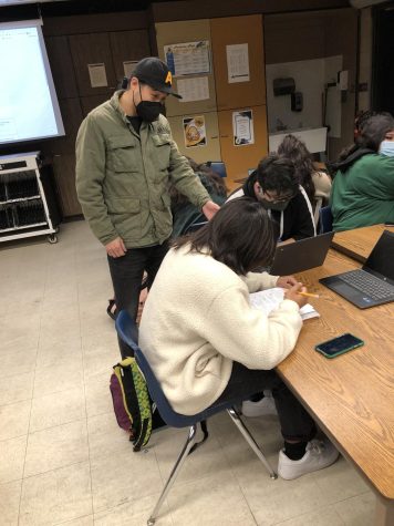 Mr.Rivas interacting with students during class