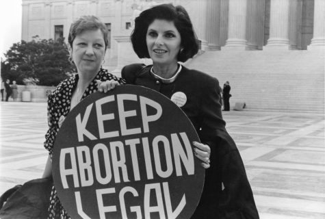 Jane Roe and her lawyer take a picture outside of the Supreme Court during the Roe v. Wade case