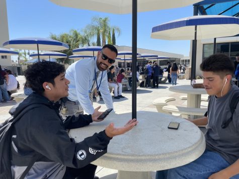 Anaheim High School Principal, Ruben Calleros, talking to students during lunch. 